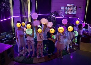 full-shot-kids-sitting-together-table
